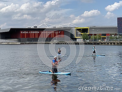 Standup Paddleboarding on the river Thames in London England Editorial Stock Photo