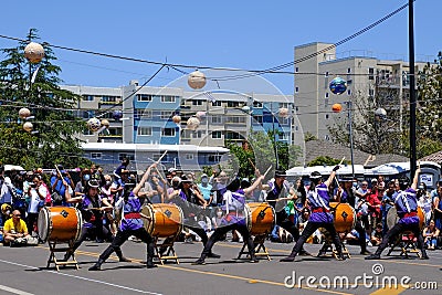 Stanford Taiko drummers performing on the street during a temple festival in San Jose, California Editorial Stock Photo