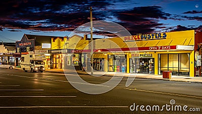 Stanthorpe, Queensland, Australia - Price Busters shop along the main street at sunset Editorial Stock Photo