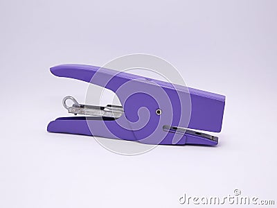 Stapler for sheets of paper. Office tool. Tool for office workers and schools. Useful metal accessory. white. Stock Photo