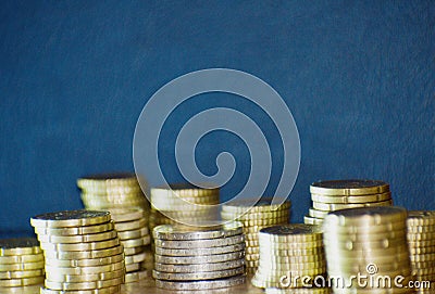 Staples of euro coins Stock Photo