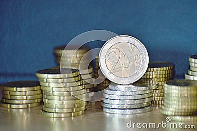 Staples of euro coins Stock Photo