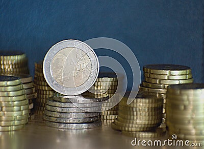 Staples of euro coins Stock Photo