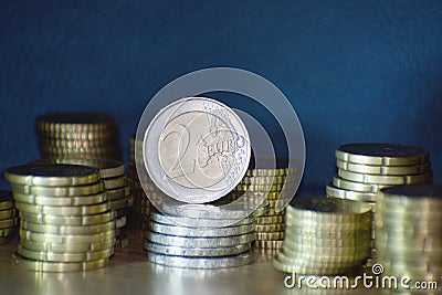 Staples of euro coins Stock Photo