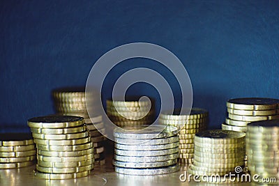 Staples of euro coins Stock Photo