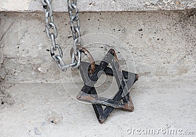 Star of David Magen David on the chain. Element of the decor of the synagogue. Symbol of Judaism, the symbol of the Jews Stock Photo