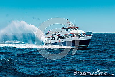 Star Line boat ferrying tourists across Lake Michigan to Mackinac Island Editorial Stock Photo
