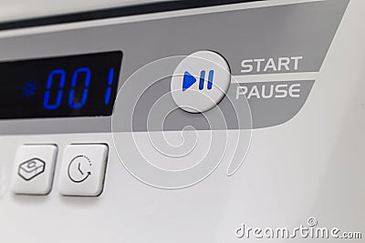 Star pause button on a dishwasher Stock Photo