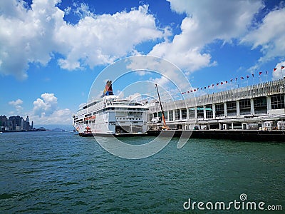 Star Pisces and Ocean Terminal Hong Kong at a sunny day Editorial Stock Photo