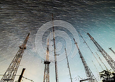 Star Trail at Communication Towers on top of Penanjakan 1 Stock Photo