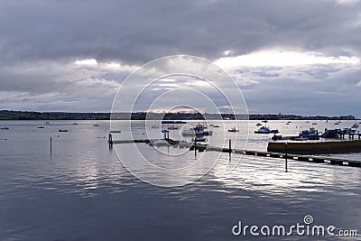 Starcross morning, Exmouth, devon: low tide, sunrise. Cloudscape horizon Editorial Stock Photo