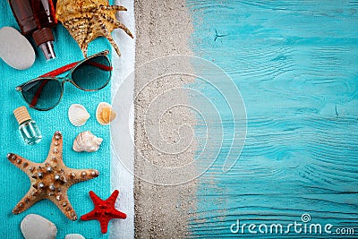 Starfish, pebbles and shells lying on a blue wooden background . There is a place for labels. Stock Photo