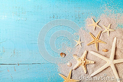 Starfish and seashell on sand for summer holidays and travel background. Stock Photo