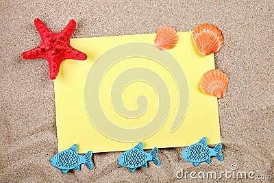 Starfish and seashells lying on the sand on the postcard. Stock Photo