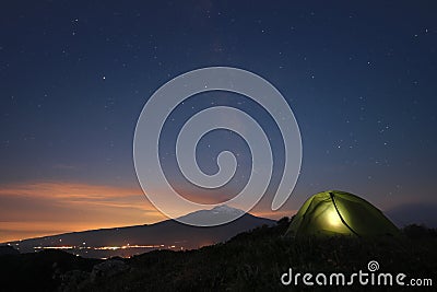 Starry night on Etna Mount and lighting tent Stock Photo