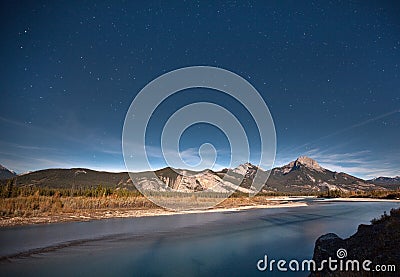 Starry night sky and mountain Stock Photo