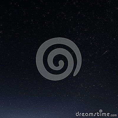 A starry sky with many stars and a flying meteor Stock Photo