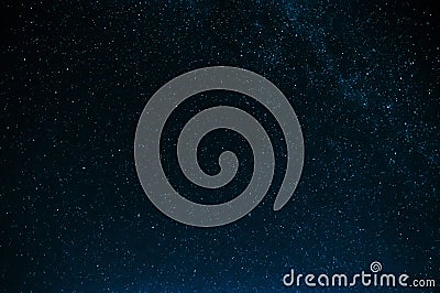 Starry sky with the milky way on dark blue background Stock Photo