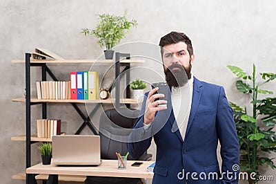 Start awesome working day. Man bearded manager businessman entrepreneur hold cup of coffee. Relaxed thoughtful top Stock Photo