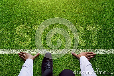 Start background, Top view of Businessman on Start line in soccer grass field, Business Challenge or do something new Stock Photo