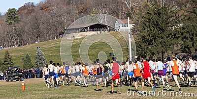 Start of boys cross country race on a hilly course Editorial Stock Photo