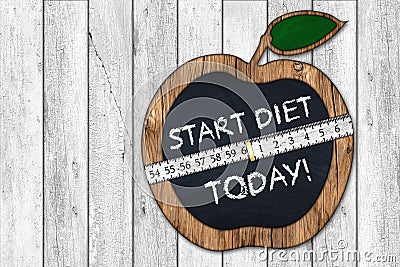 Start diet today apple blackboard Stock Photo