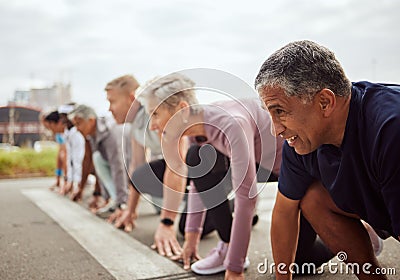 Start, fitness or senior people in a marathon race with running goals in workout or runners exercise. Motivation, focus Stock Photo