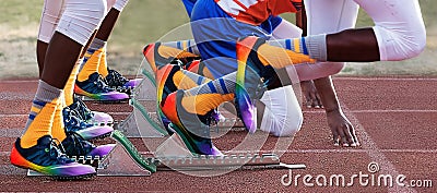 Start of 400m race at track meet Stock Photo