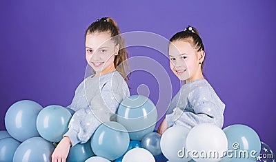 Start party. Birthday party. International childrens day. Carefree childhood. Sisters organize home party. Greeting Stock Photo