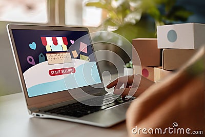 Start to Selling Online Concept. Young Woman Using Computer laptop to Open her Own Shop in Online Marketplace Stock Photo