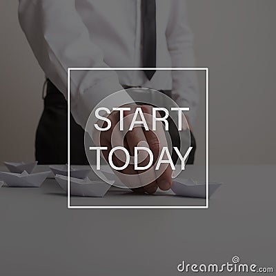 Start today sign over a business leader holding the leading boat Stock Photo