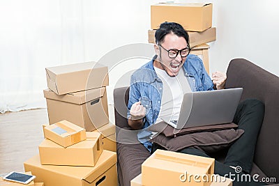 Start up small business entrepreneur SME or freelance asian man typing computer Stock Photo