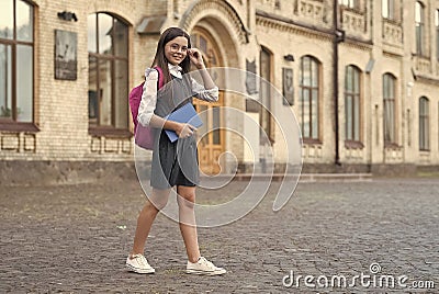 Start where you are. Happy child wear uniform on September 1. Back to school. Primary education. September 1. Knowledge Stock Photo