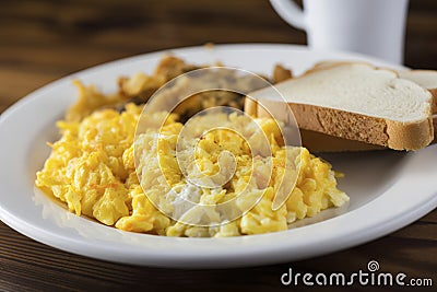 A Breakfast Featuring A Plate Of Fluffy Scrambled Eggs Crispy Hash A Breakfast Featuring A Plate Of Fluffy Scrambled Eggs Crispy Hash