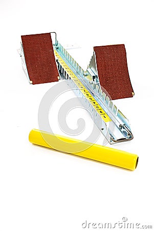 Starting block and baton Stock Photo