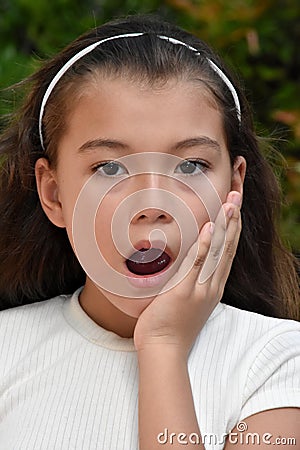 A Startled Philippina Girl Child Closeup Stock Photo