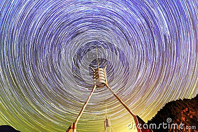 Startrails with interesting buildings pointing to the polaris in the center Stock Photo