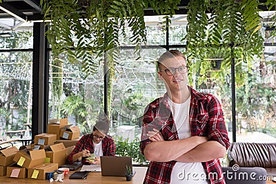 startup small business owner working at workplace. freelance couple seller check product order for delivery. Online Stock Photo