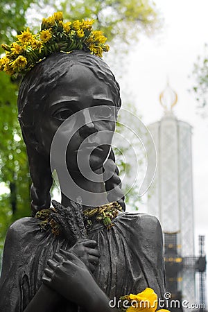 Starving girl statue. Memorial in Commemoration of Famines' Victims in Ukraine. Editorial Stock Photo