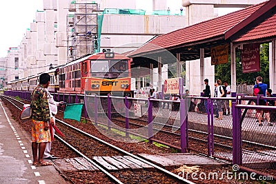 State Railways of Thailand SRT orange diesel electric train locomotive parked at Donmuang railway station Editorial Stock Photo