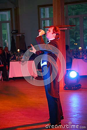 The statement by the master of art whistle singer Alexander Brahmin on the stage of the country club Giving Editorial Stock Photo