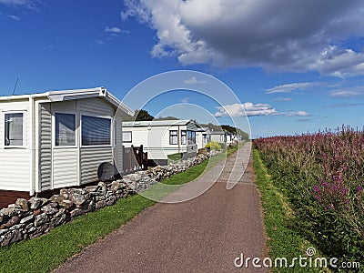 Static Caravans at Waird Park Carvan Site and Recreation Ground near to the Beach at the small Fishing Port of Johnshaven Editorial Stock Photo