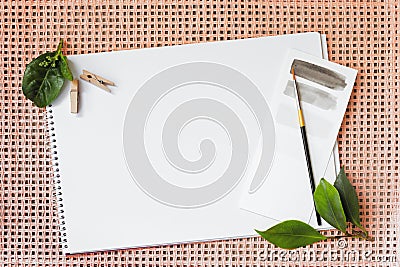 Stationery flatlay, with a natural feel, coral background Stock Photo