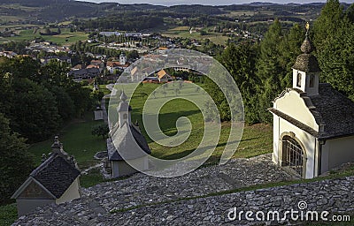 Stations of the Cross with village Smarje pri Jelsah in background, Slovenia Stock Photo