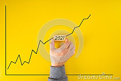 Statistical financial graph predicting an economic growth in 2021 after the 2020 global coronavirus pandemic Stock Photo