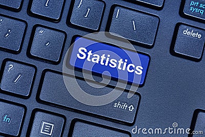 Statistics word on computer keyboard Stock Photo