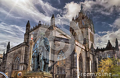 Statue of Adam Smith and the Sir Giles Cathedral on the Royal Mi Stock Photo