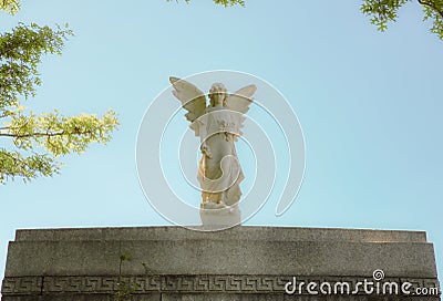 The statue of angel on the gravestone Editorial Stock Photo
