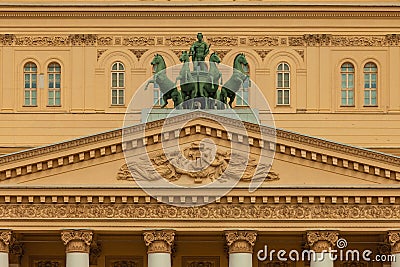 Statue of Apollo managing a cart of horses harnessed to a chariot on the roof of the Bolshoi Theater in Moscow Editorial Stock Photo