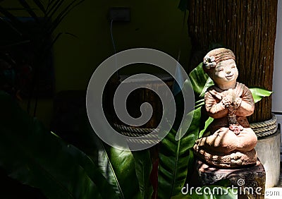 Statue of an asian girl Stock Photo